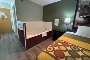 Suite, 1 King Bed, Non Smoking | Bathroom | Combined shower/tub, free toiletries, hair dryer, towels