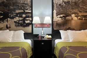 A hotel room with two beds, a nightstand with a lamp, a phone, and a wall mural of a bridge over water.