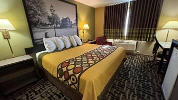 Desk, laptop workspace, blackout drapes, iron/ironing board