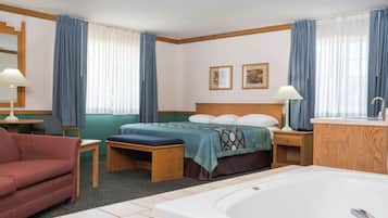 Suite, 1 King-Bett und Schlafsofa, Nichtraucher, Whirlpool | Schreibtisch, Zustellbetten, kostenloses WLAN, Bettwäsche