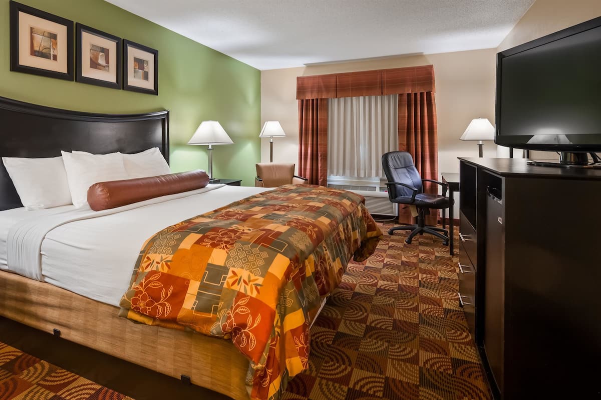 Premium bedding, pillow-top beds, desk, laptop workspace