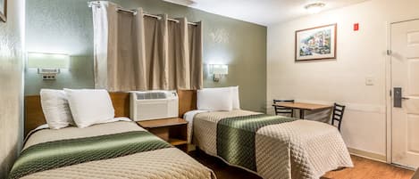 Desk, blackout curtains, free WiFi, bed sheets