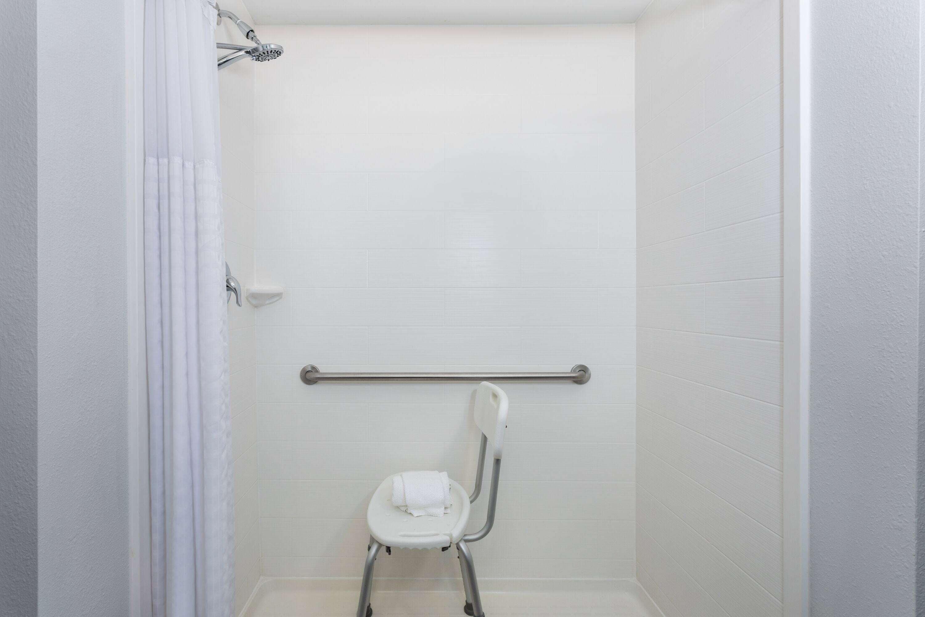 combined shower/bathtub, eco-friendly toiletries, hair dryer, towels