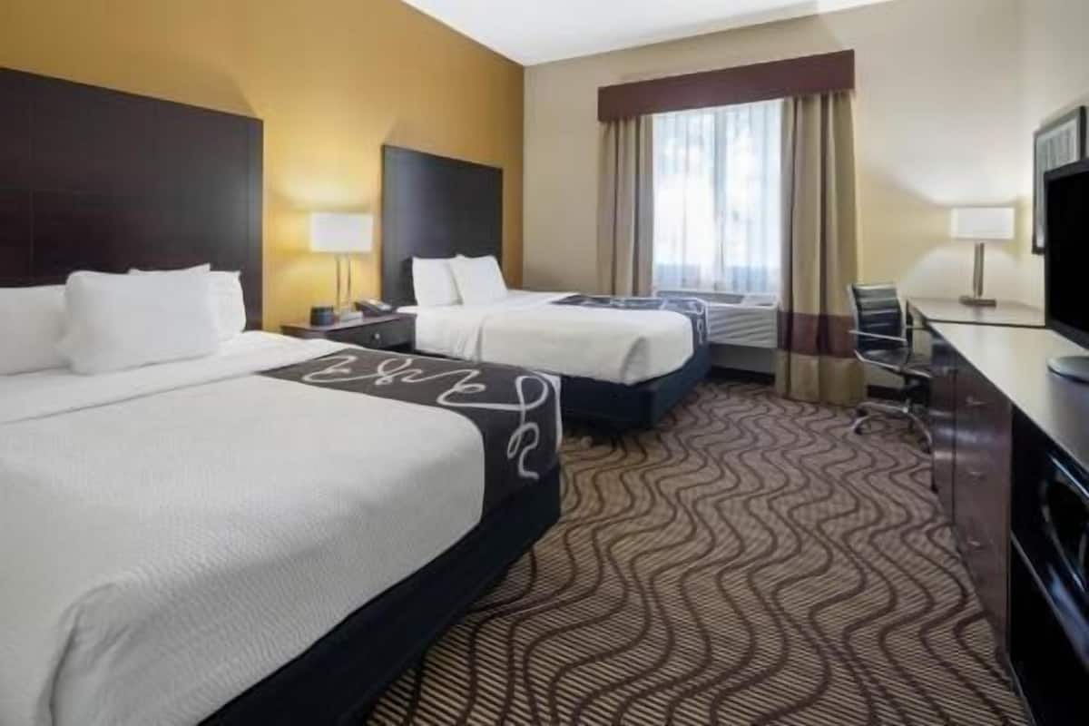 Premium bedding, desk, blackout drapes, iron/ironing board