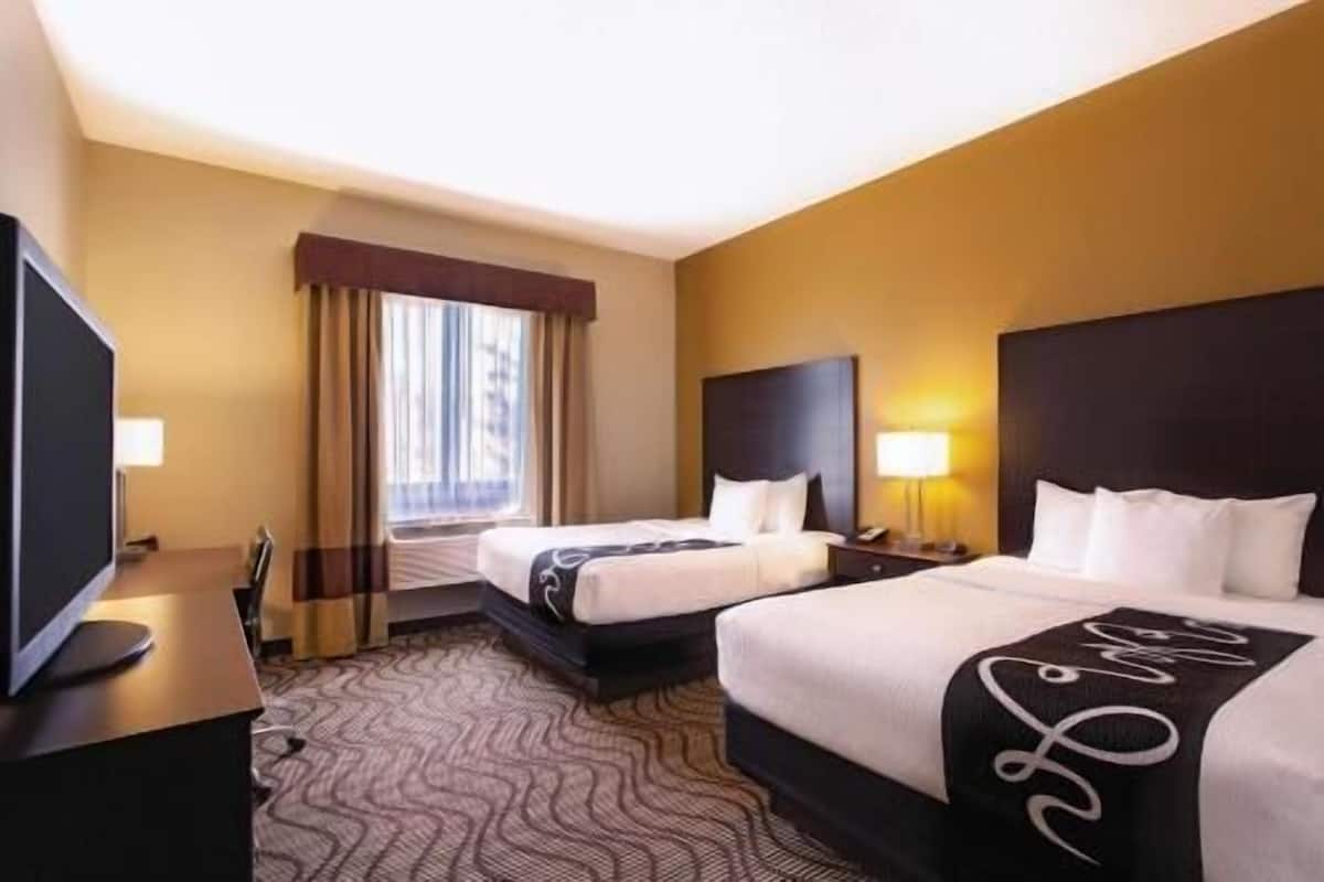 Premium bedding, desk, blackout drapes, iron/ironing board