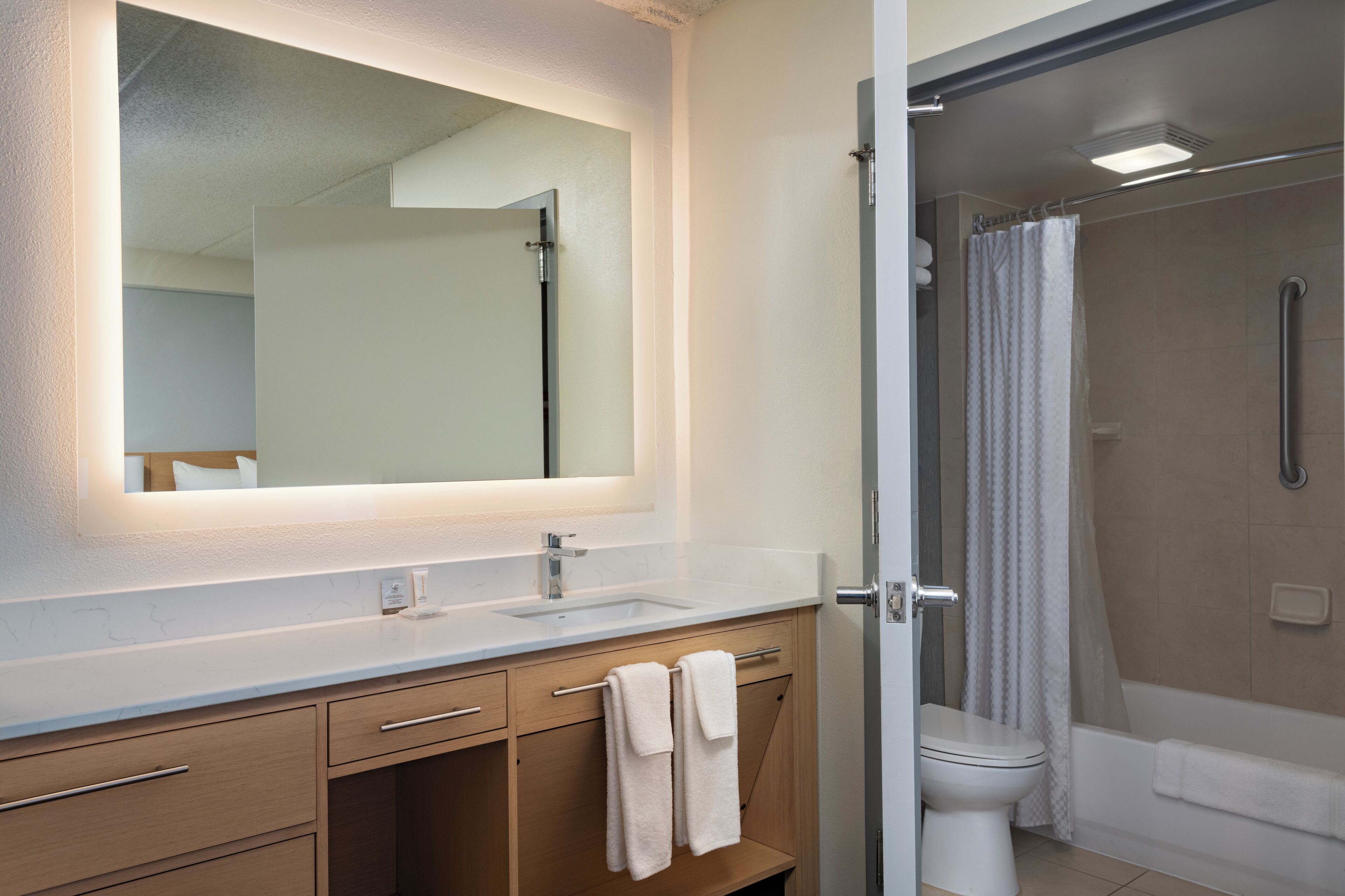 room, multiple beds (specialty) | bathroom | combined shower/bathtub, designer toiletries, hair dryer, towels