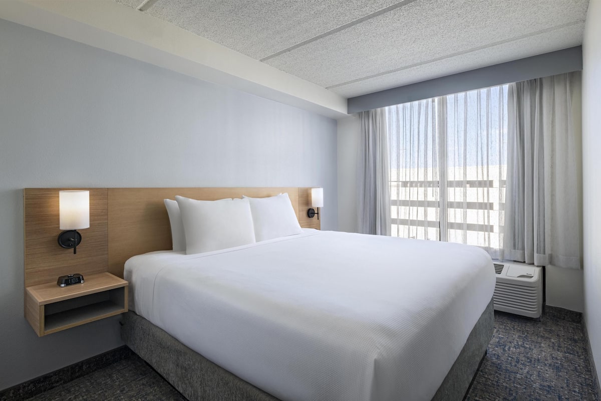 Premium bedding, desk, blackout drapes, iron/ironing board