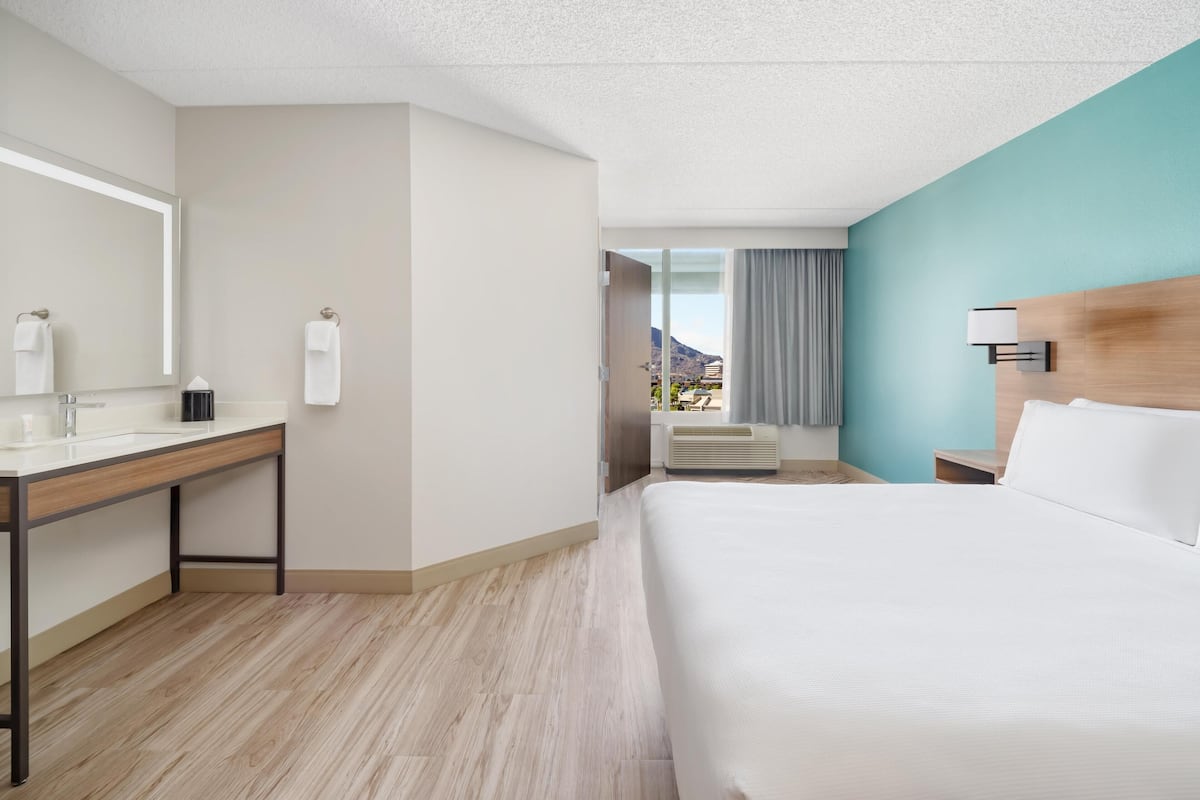 Premium bedding, pillow-top beds, in-room safe, desk