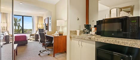 Suite, 1 King Bed, Non Smoking | Laptop workspace, blackout curtains, iron/ironing board, free WiFi