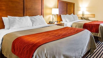 Premium bedding, laptop workspace, blackout drapes, iron/ironing board