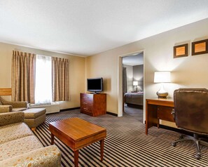 Premium bedding, laptop workspace, blackout drapes, iron/ironing board