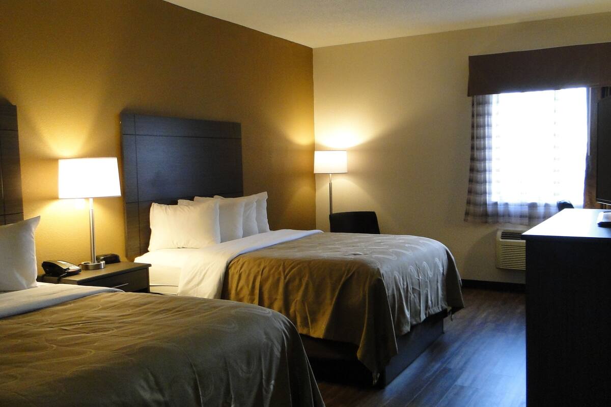 standard room, 2 queen beds, non smoking | in-room safe, desk, iron/ironing board, free wifi