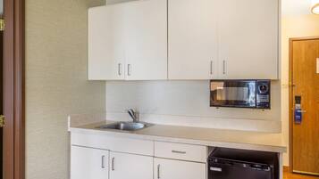 Suite, 1 King Bed with Sofa bed, Non Smoking | Premium bedding, desk, blackout drapes, iron/ironing board