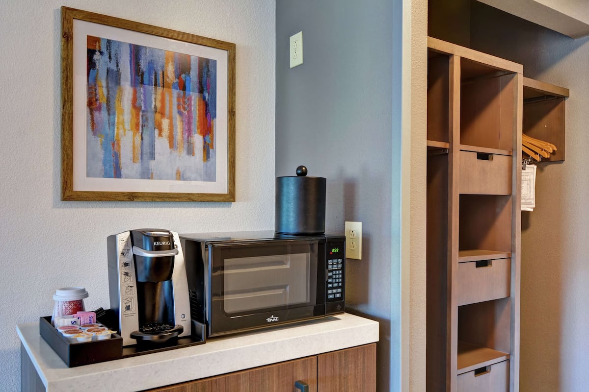 down duvets, blackout curtains, iron/ironing board, cots/infant beds