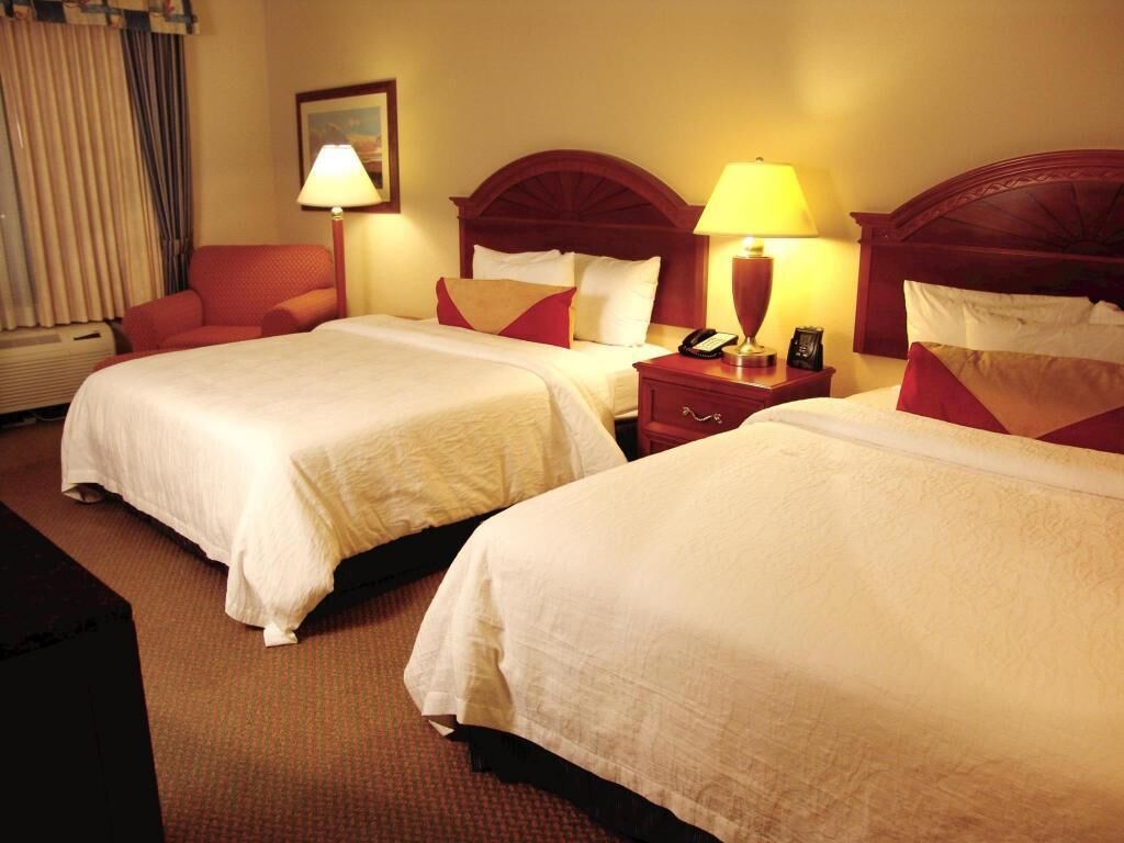 Down comforters, blackout drapes, iron/ironing board, cribs/infant beds