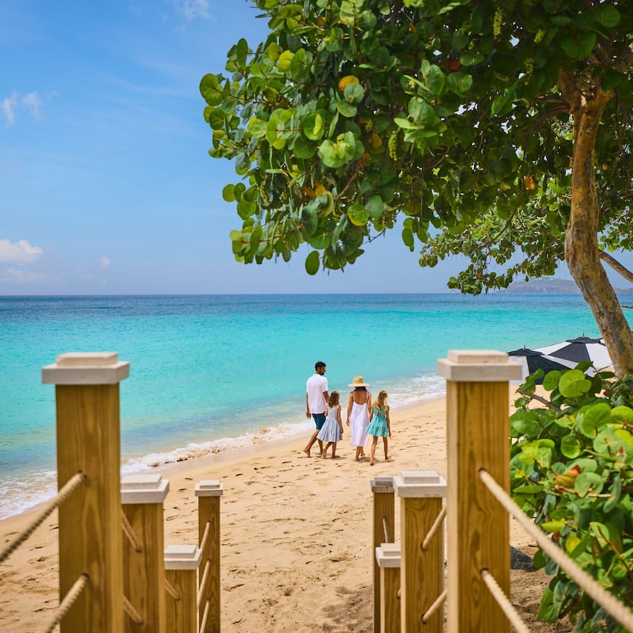 On the beach, white sand, beach cabanas, beach towels