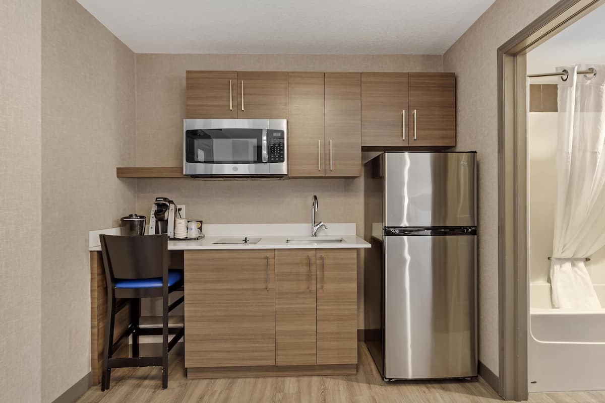 Suite, 2 Queen Beds, Non Smoking, Kitchenette (Living Room;with Sofabed) | Premium bedding, desk, laptop workspace, blackout curtains