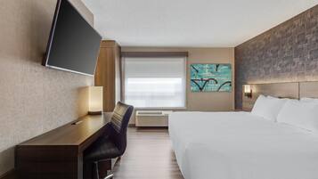 Suite, 1 King Bed, Non Smoking, Kitchenette (Shower Only;with Sofabed) | Premium bedding, desk, laptop workspace, blackout drapes