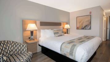 Room, 1 King Bed (Coast King) | Desk, iron/ironing board, free WiFi, bed sheets