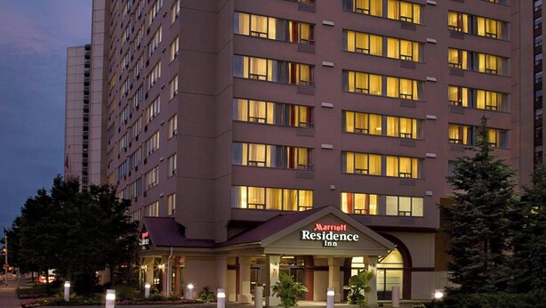 A multi-story hotel with a flat facade, numerous windows, and a marquee sign indicating it is a Marriott Residence Inn. - Residence Inn by Marriott London Ontario (London)