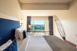 Deluxe Room | Premium bedding, in-room safe, desk, blackout curtains