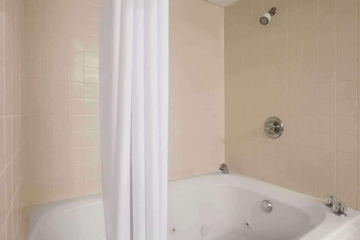 rainfall showerhead, hair dryer, towels, soap