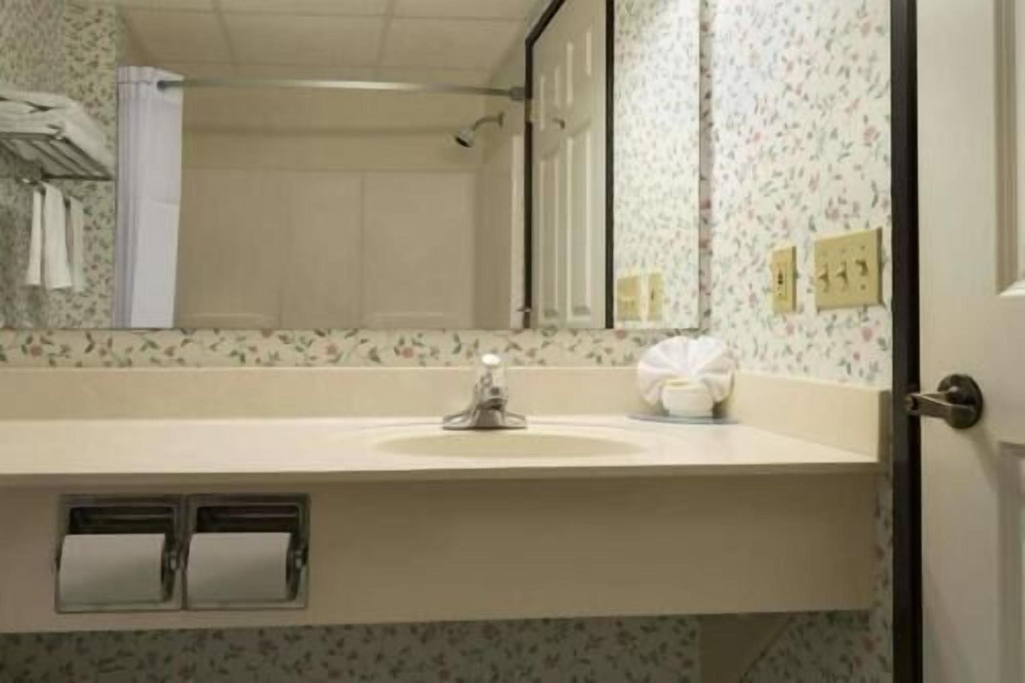 Bathroom | Rainfall showerhead, hair dryer, towels, soap