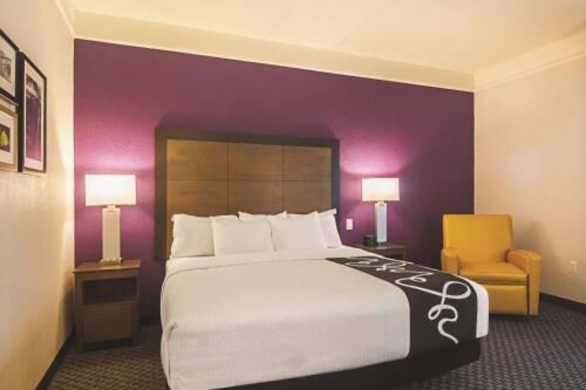 Premium bedding, desk, blackout drapes, iron/ironing board