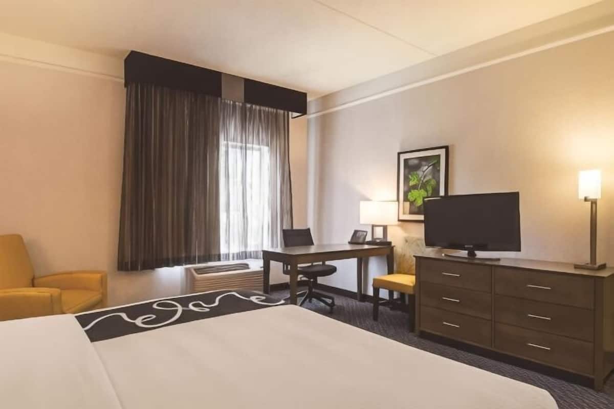 Premium bedding, desk, blackout drapes, iron/ironing board