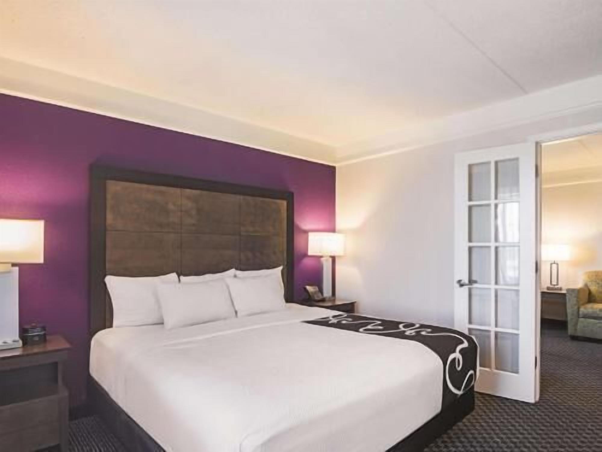 Premium bedding, desk, blackout drapes, iron/ironing board