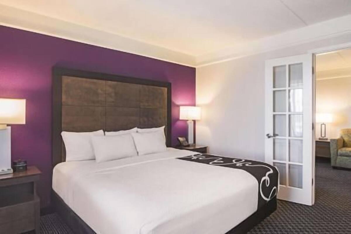 Premium bedding, desk, blackout drapes, iron/ironing board