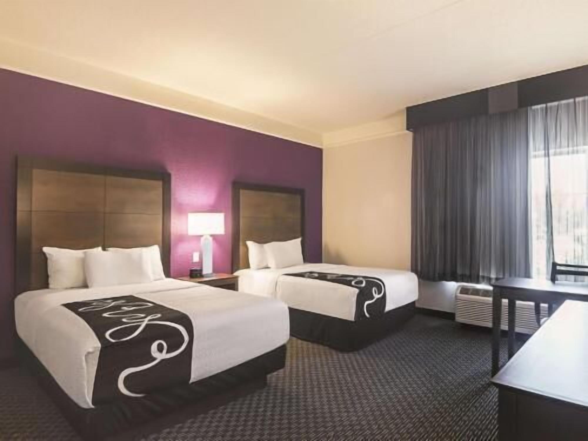 Premium bedding, desk, blackout drapes, iron/ironing board