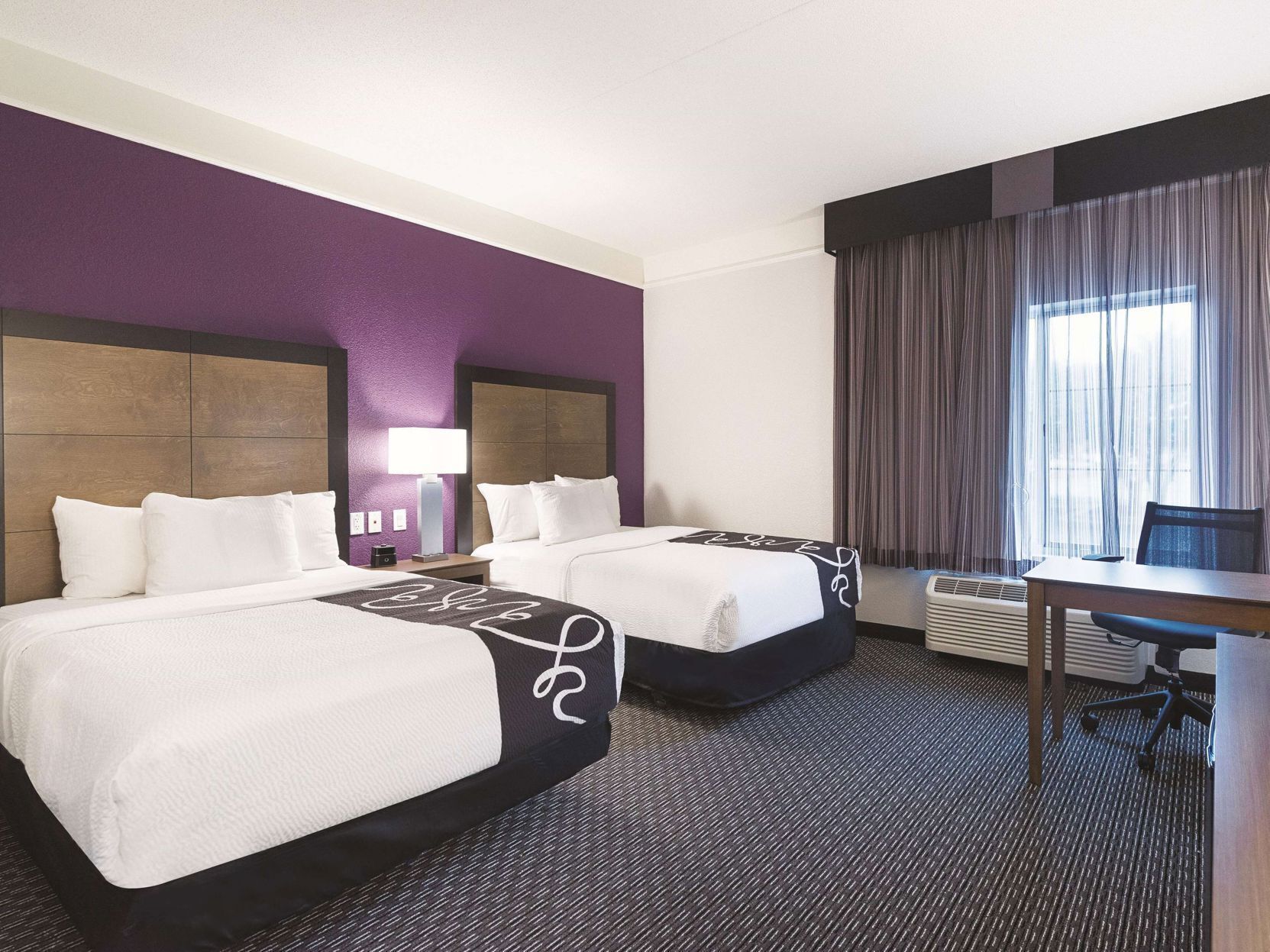Premium bedding, desk, blackout drapes, iron/ironing board