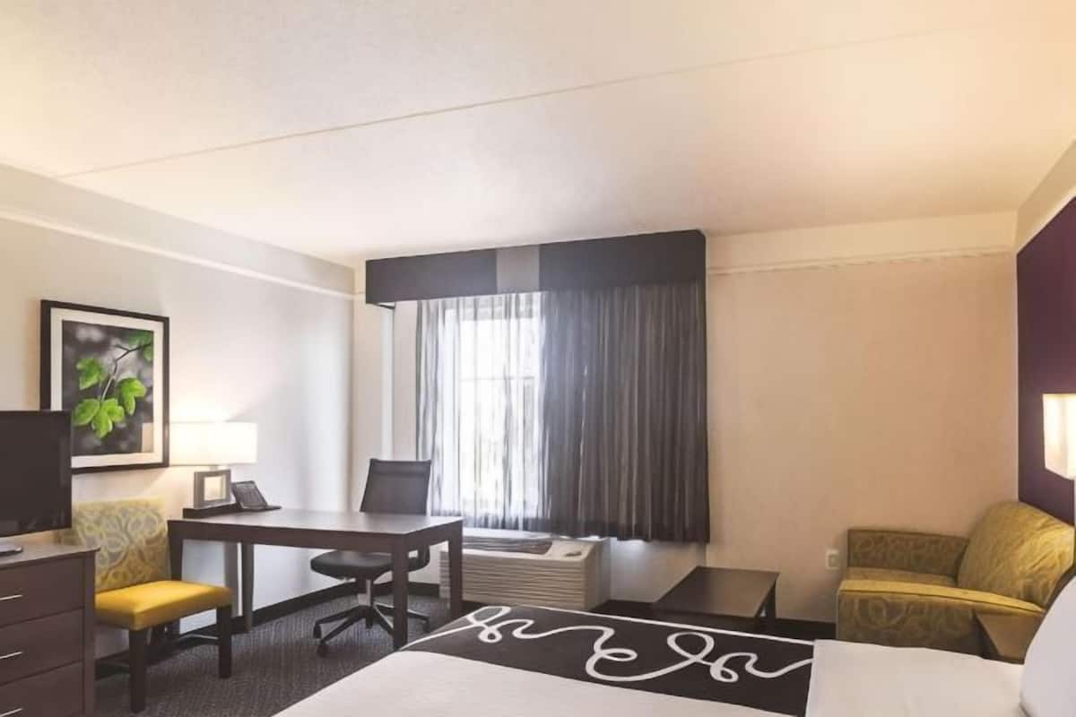 Premium bedding, desk, blackout drapes, iron/ironing board