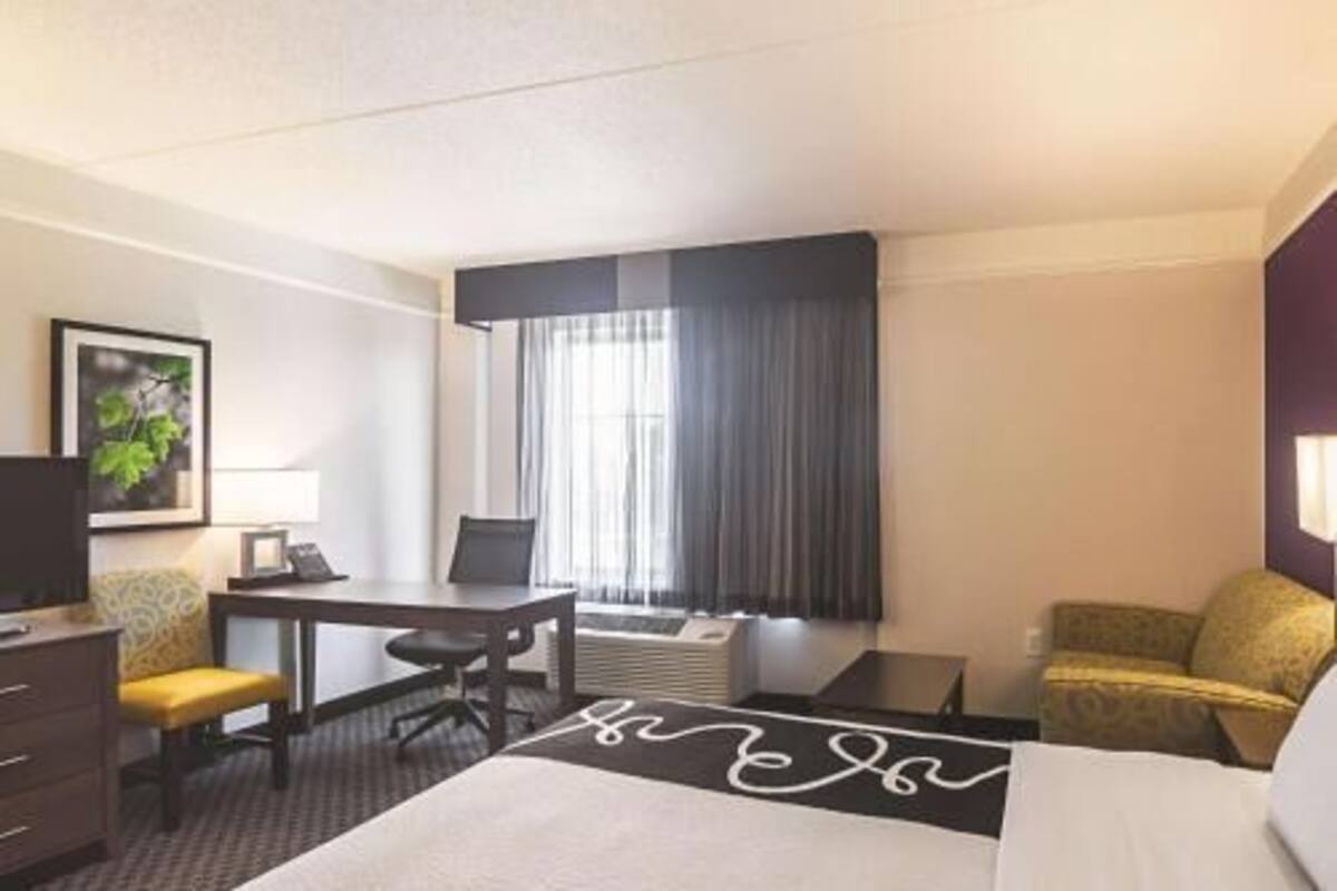 Premium bedding, desk, blackout drapes, iron/ironing board