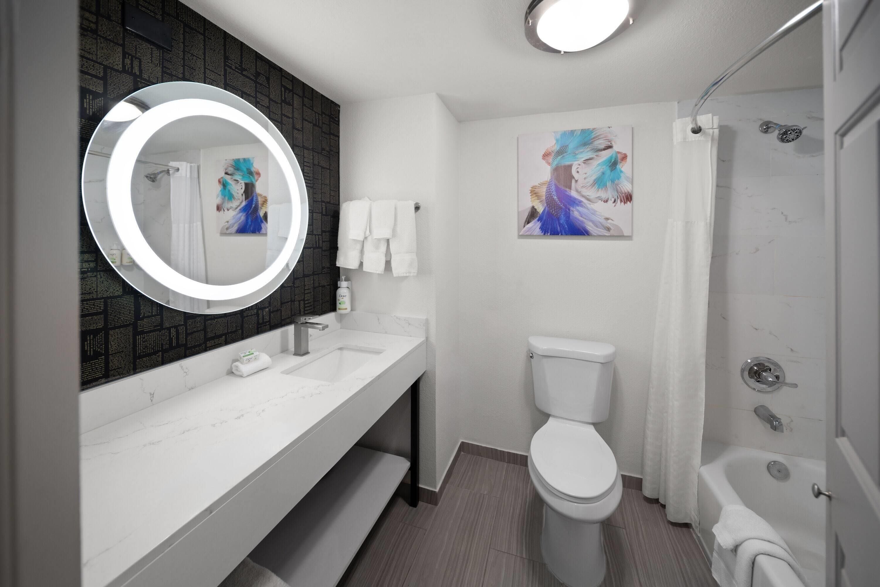 combined shower/bathtub, free toiletries, hair dryer, towels