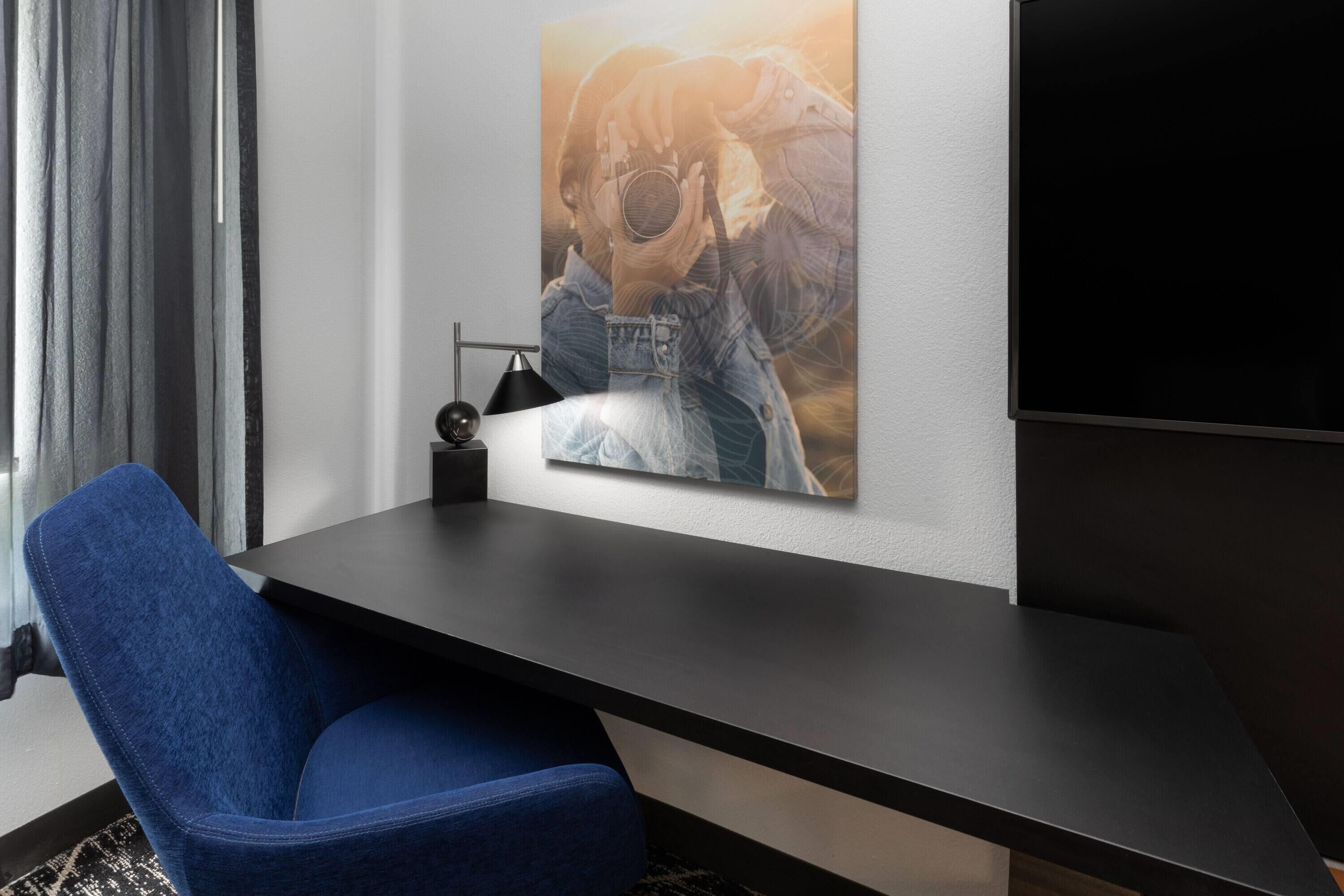 pillow-top beds, desk, laptop workspace, blackout curtains