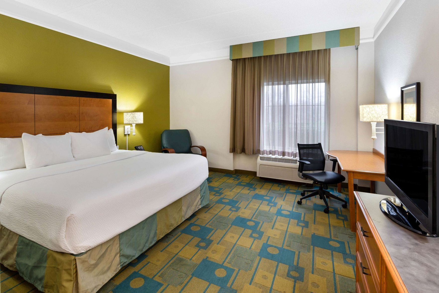 Premium bedding, pillowtop beds, desk, blackout drapes