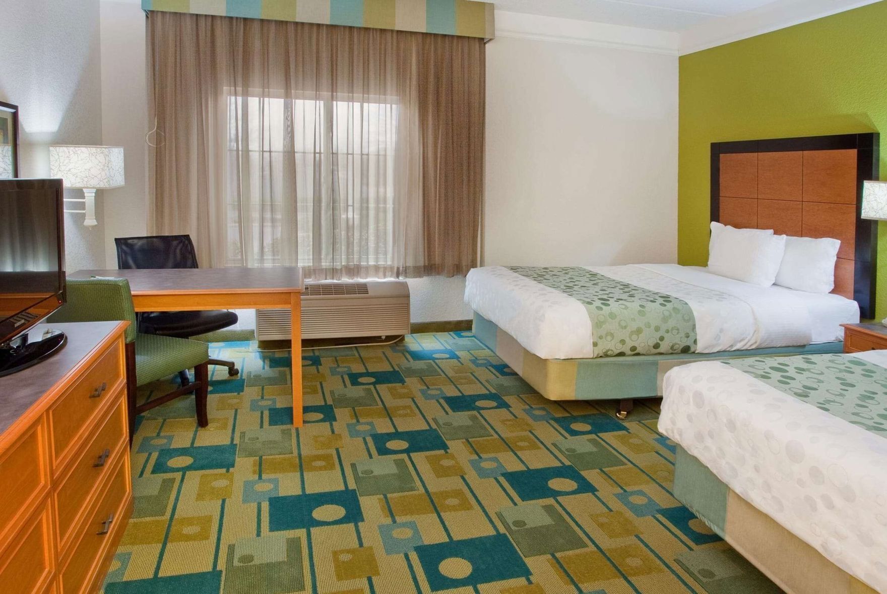 Premium bedding, pillowtop beds, desk, blackout drapes