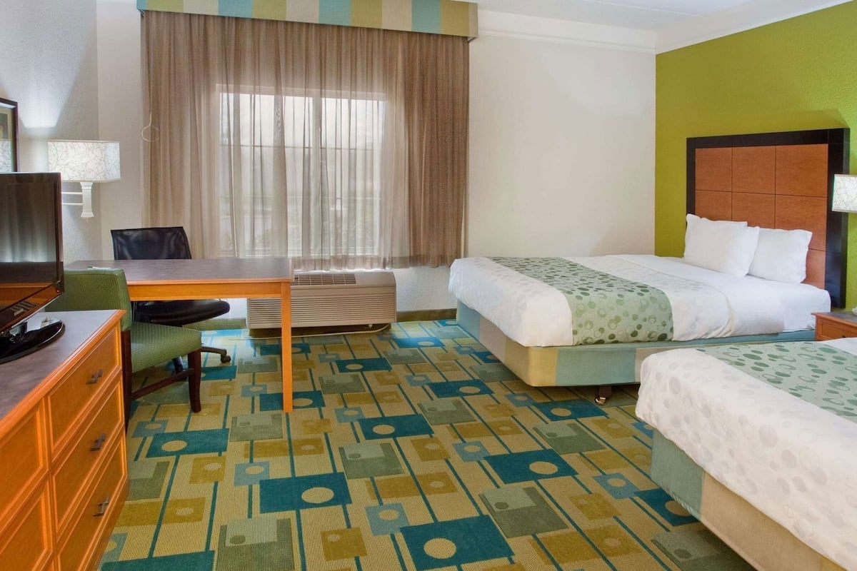 Premium bedding, pillowtop beds, desk, blackout drapes