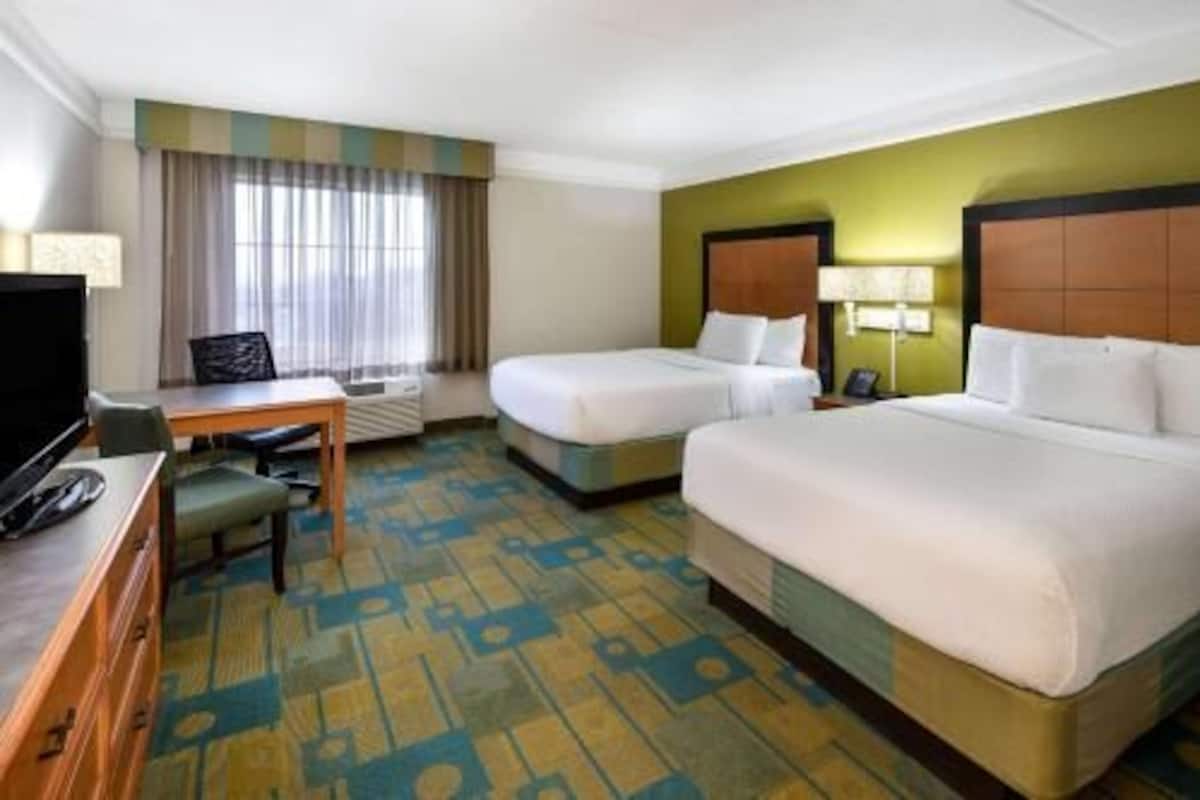 Premium bedding, pillowtop beds, desk, blackout drapes