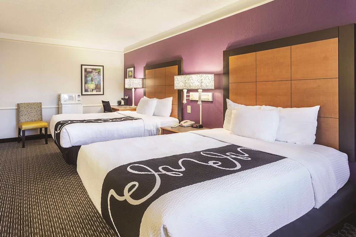 premium bedding, desk, laptop workspace, iron/ironing board