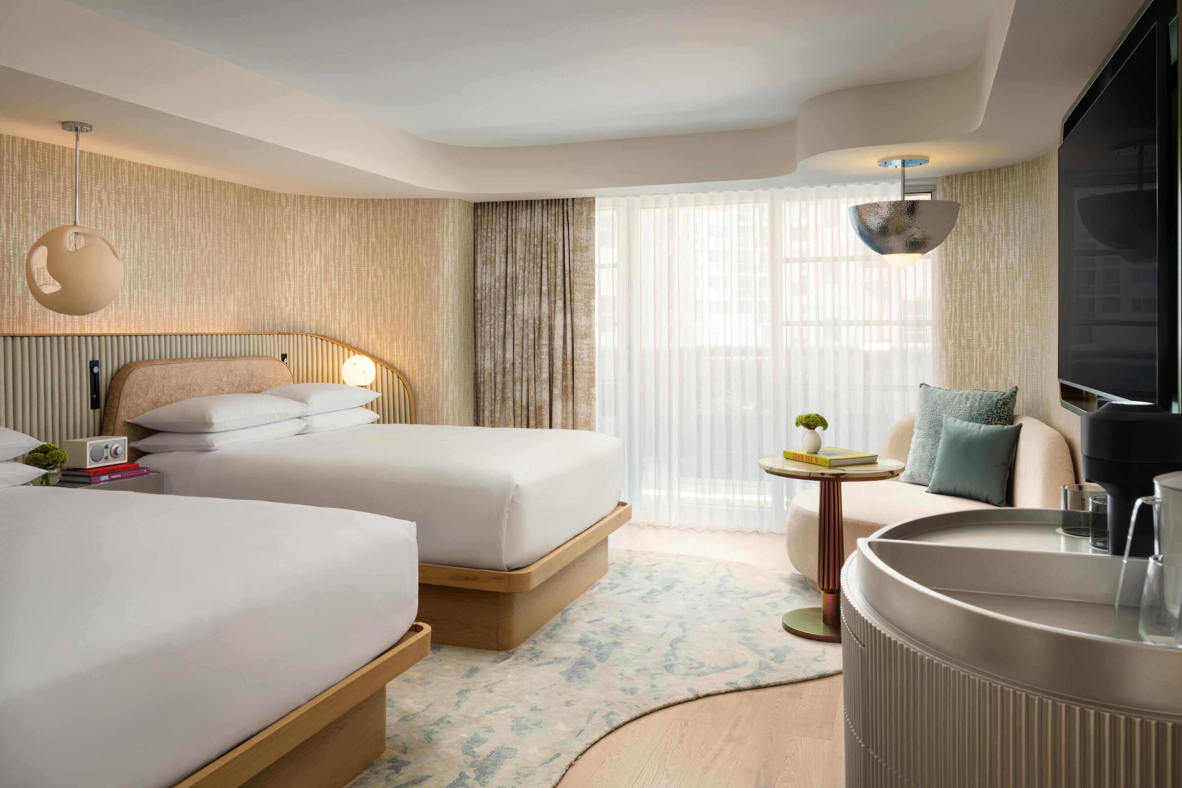 Premium bedding, down comforters, in-room safe, desk