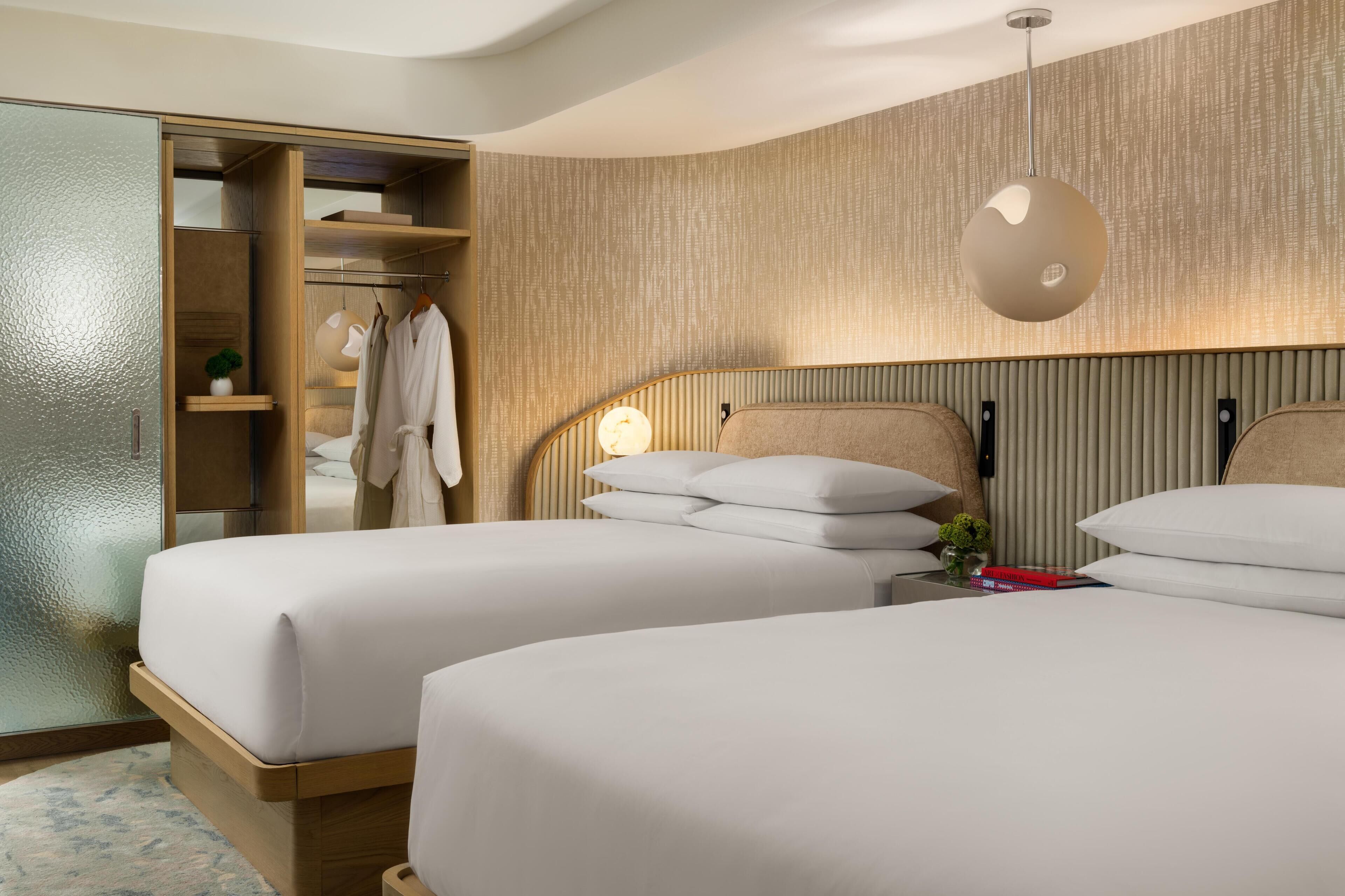 Premium bedding, down comforters, in-room safe, desk