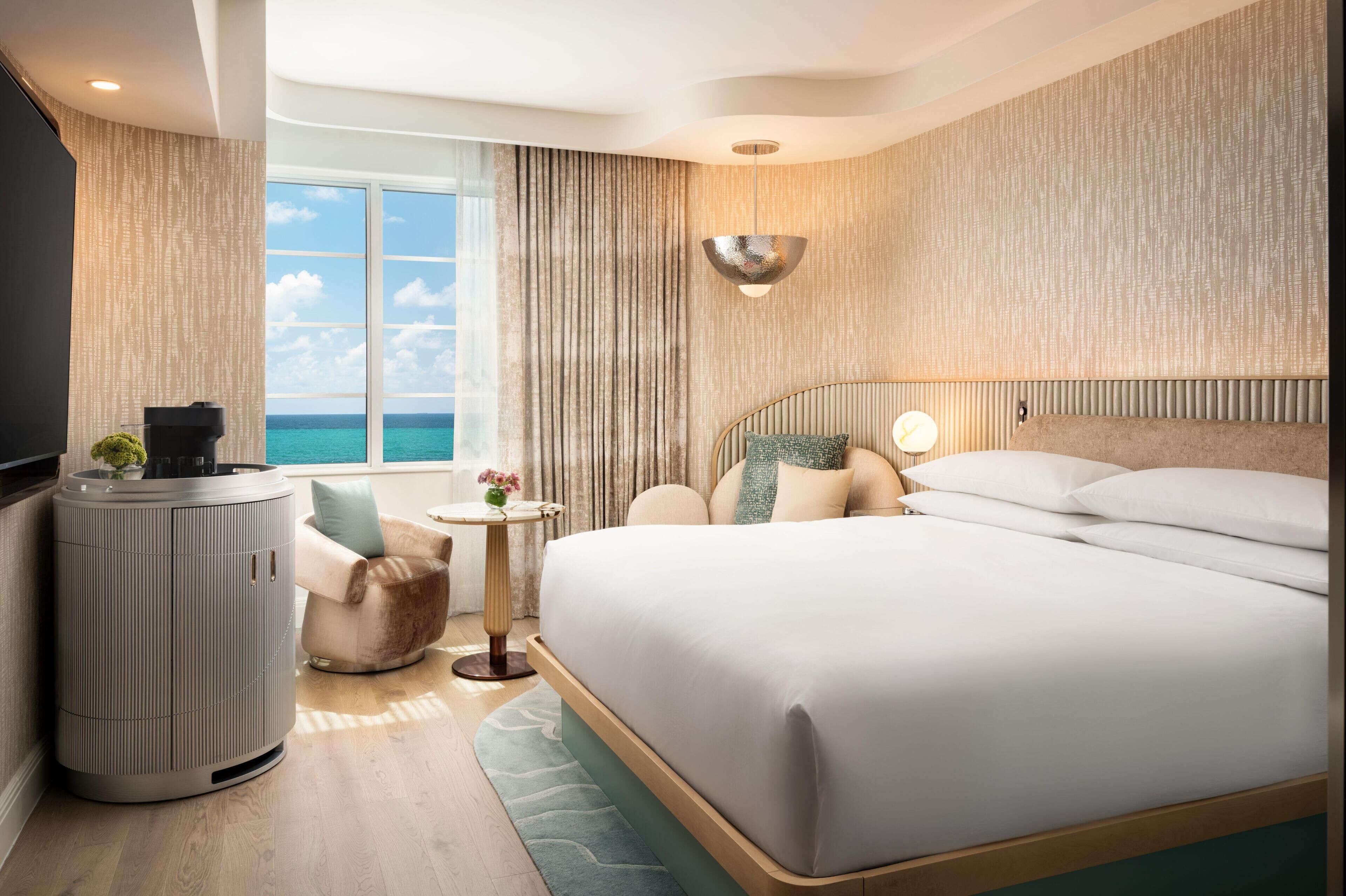 Premium bedding, down comforters, in-room safe, desk