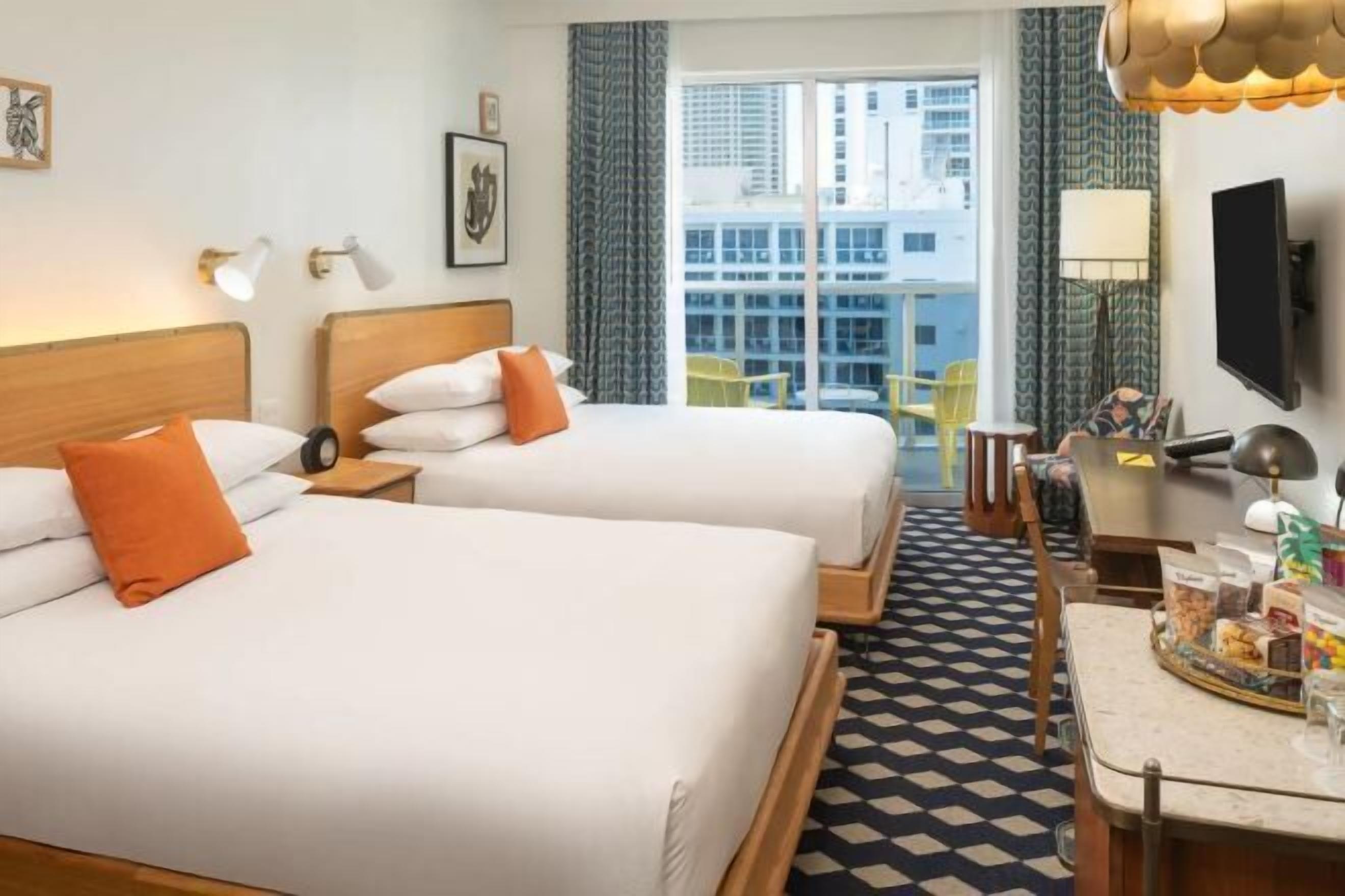 Premium bedding, down comforters, in-room safe, desk