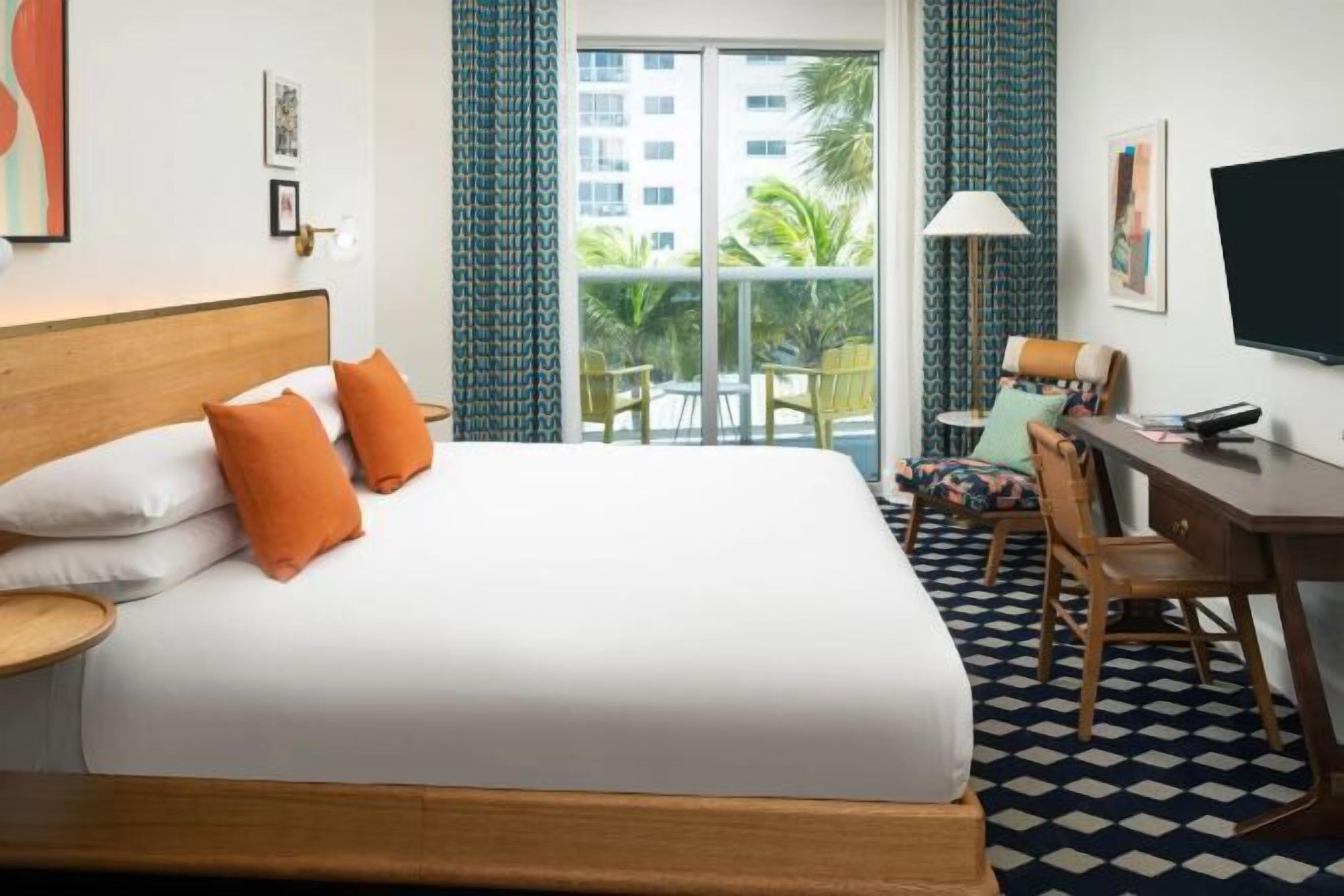 Premium bedding, down comforters, in-room safe, desk