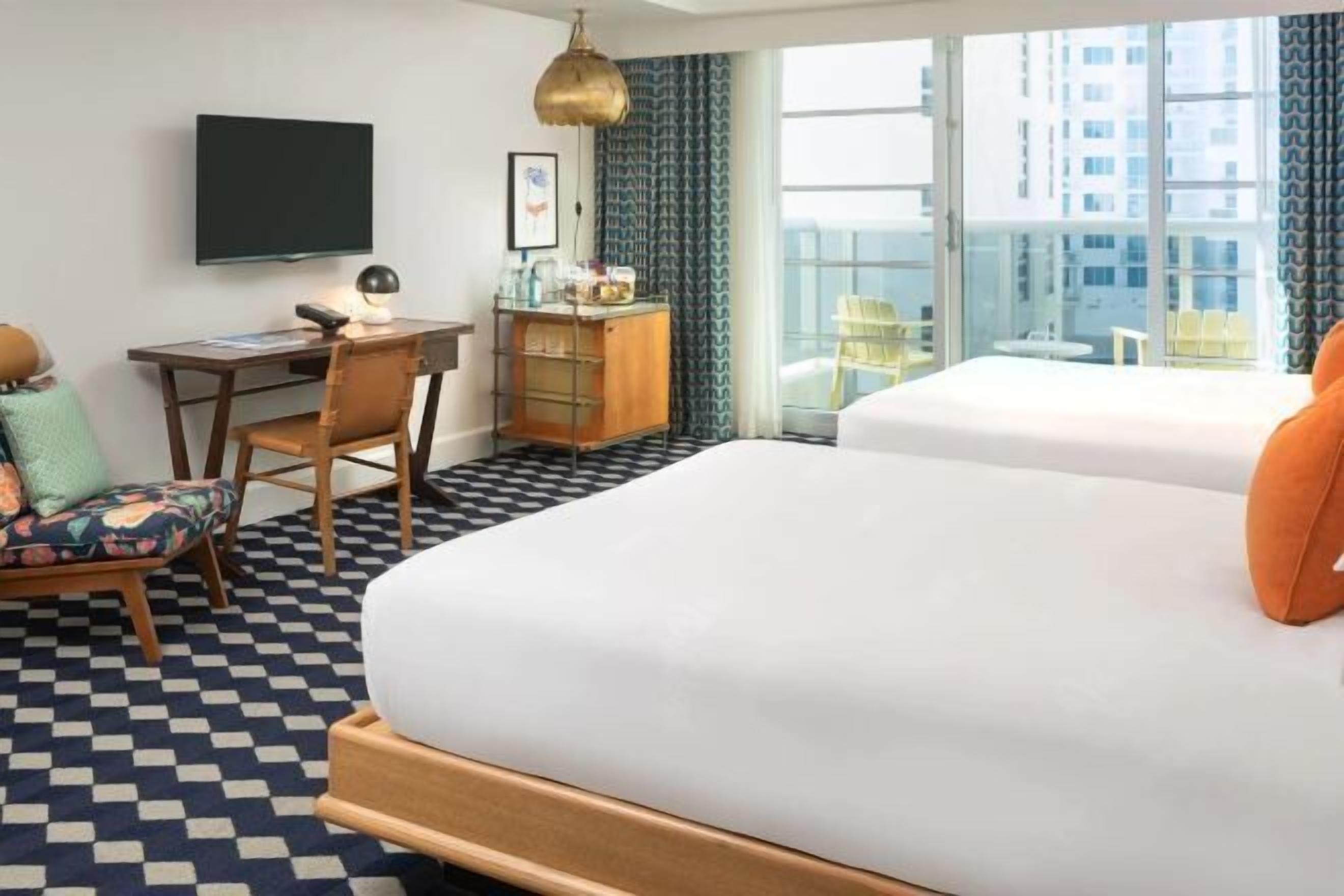 Premium bedding, down comforters, in-room safe, desk