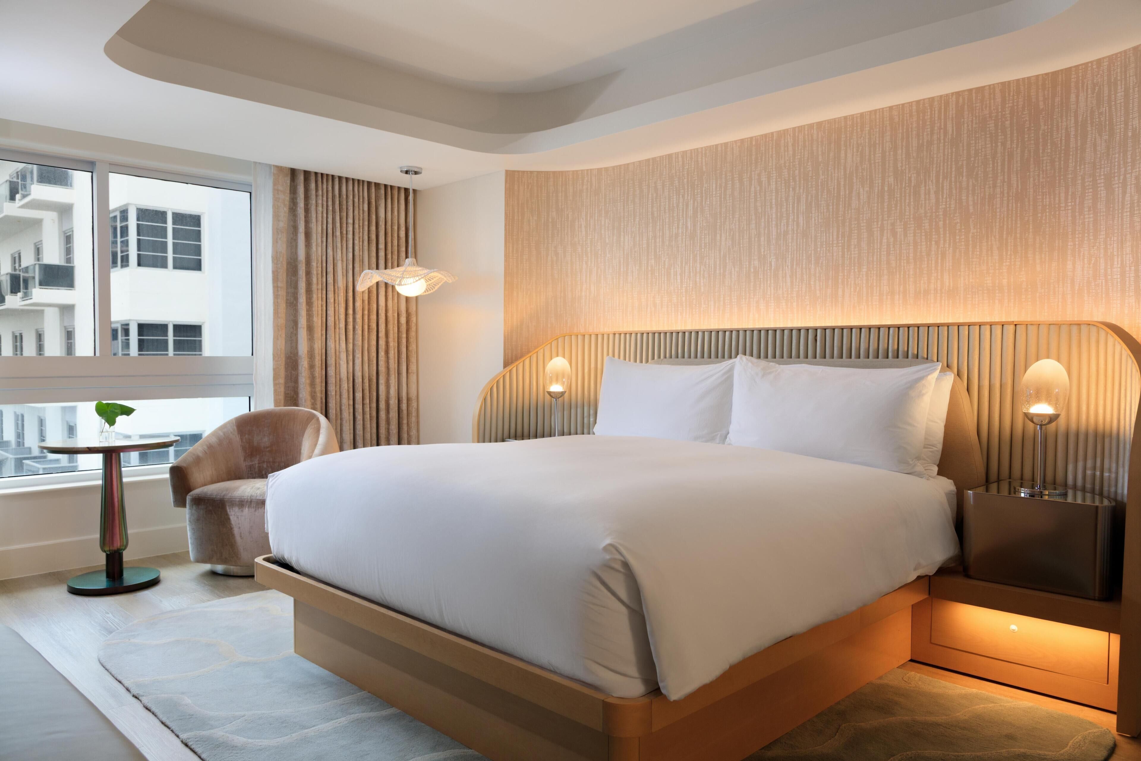 Premium bedding, down comforters, in-room safe, desk