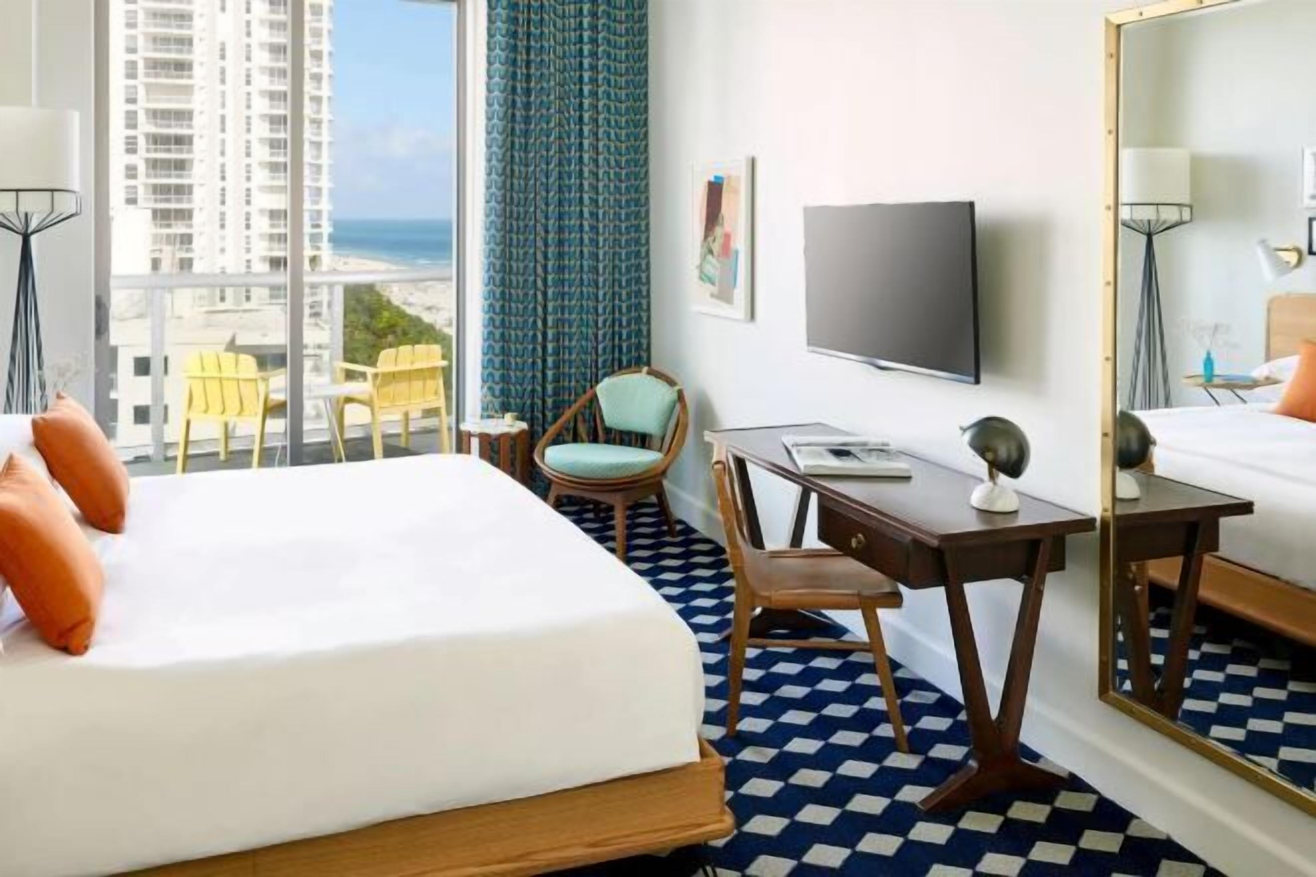 Premium bedding, down comforters, in-room safe, desk